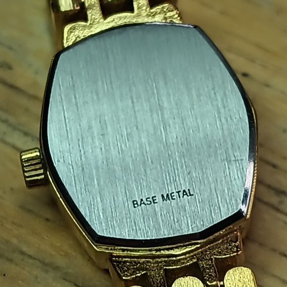 X Ladies gold plated watch, band black dial 2 hand movement diamond at 12 - Picture 8 of 9